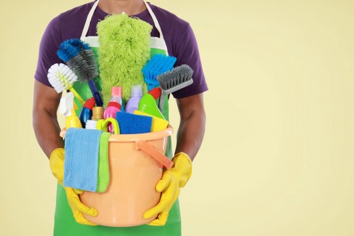 Cleaner using protective gear during carpet cleaning