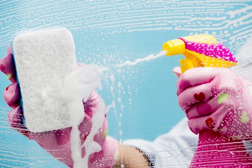 Local oven cleaner working in a South London kitchen in SE17