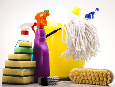 Upholstery cleaner treating a fabric sofa in a South London flat
